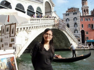 Not the best picture of me... but I like this picture because of the gondola at the back, so please focus on that... and the Rialto Bridge
